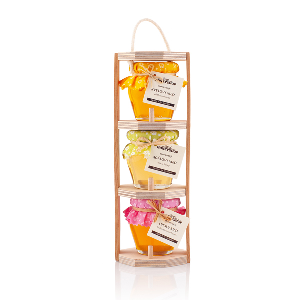 Trio of honeys in a wooden stand